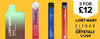 A Lost Mary Bm600, Crystal Bar, Elf Bar and Vuse GO 700 disposable vape on a orange background, with a white label stating '3 For £12' and the brands logos below, on the House of Vapes - London homepage.